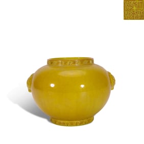 Qing Dynasty Qianlong period, Yellow-glazed jar with double lion ears