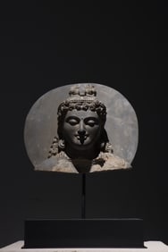 A Gandhara-style stone-carved Buddha statue