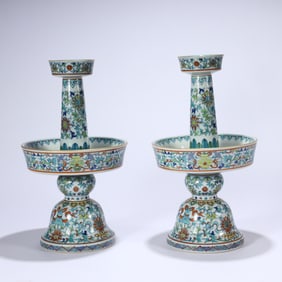 A PAIR OF QING DYNASTY DOUCAI CANDLESTICKS