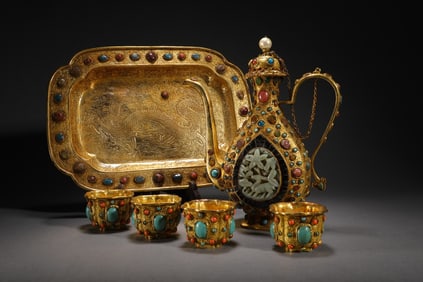 A SET OF LIAO DYNASTY GILT BRONZE WINE POTS INLAID WITH JADE