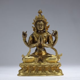 GILDED BRONZE FOUR-ARMED GUANYIN STATUE