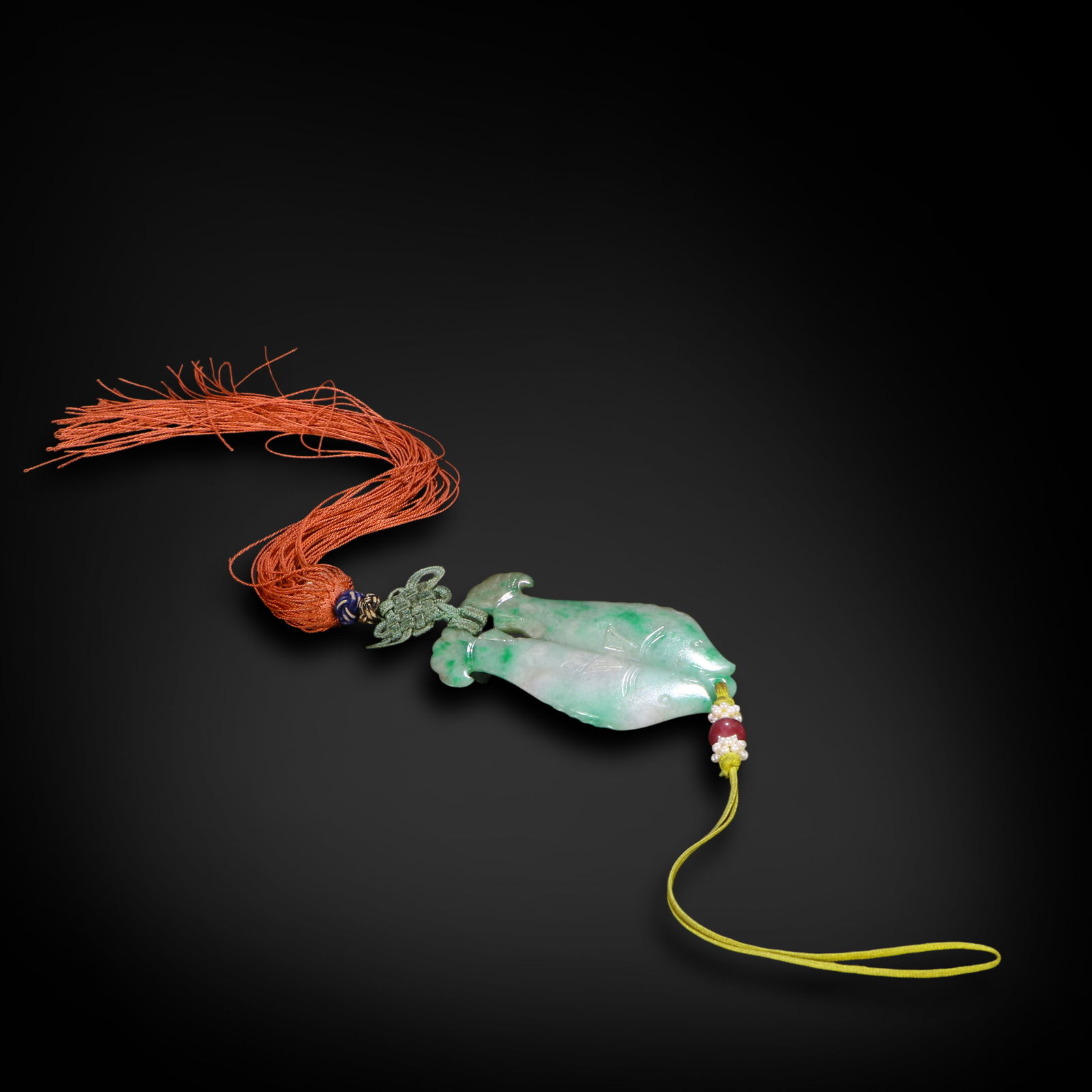 Qing Dynasty Jadeite pendant carved with double fish (1 of 3)