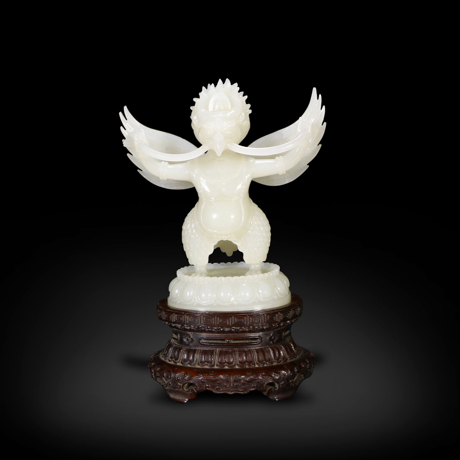 Qing Dynasty Hetian white jade carved Garuda statue: Name Qing Dynasty Hetian white jade carved Garuda statue Dimensions H:10.6cm W:10.1cm Condition Additional photographs and condition reports are available upon request as a courtesy