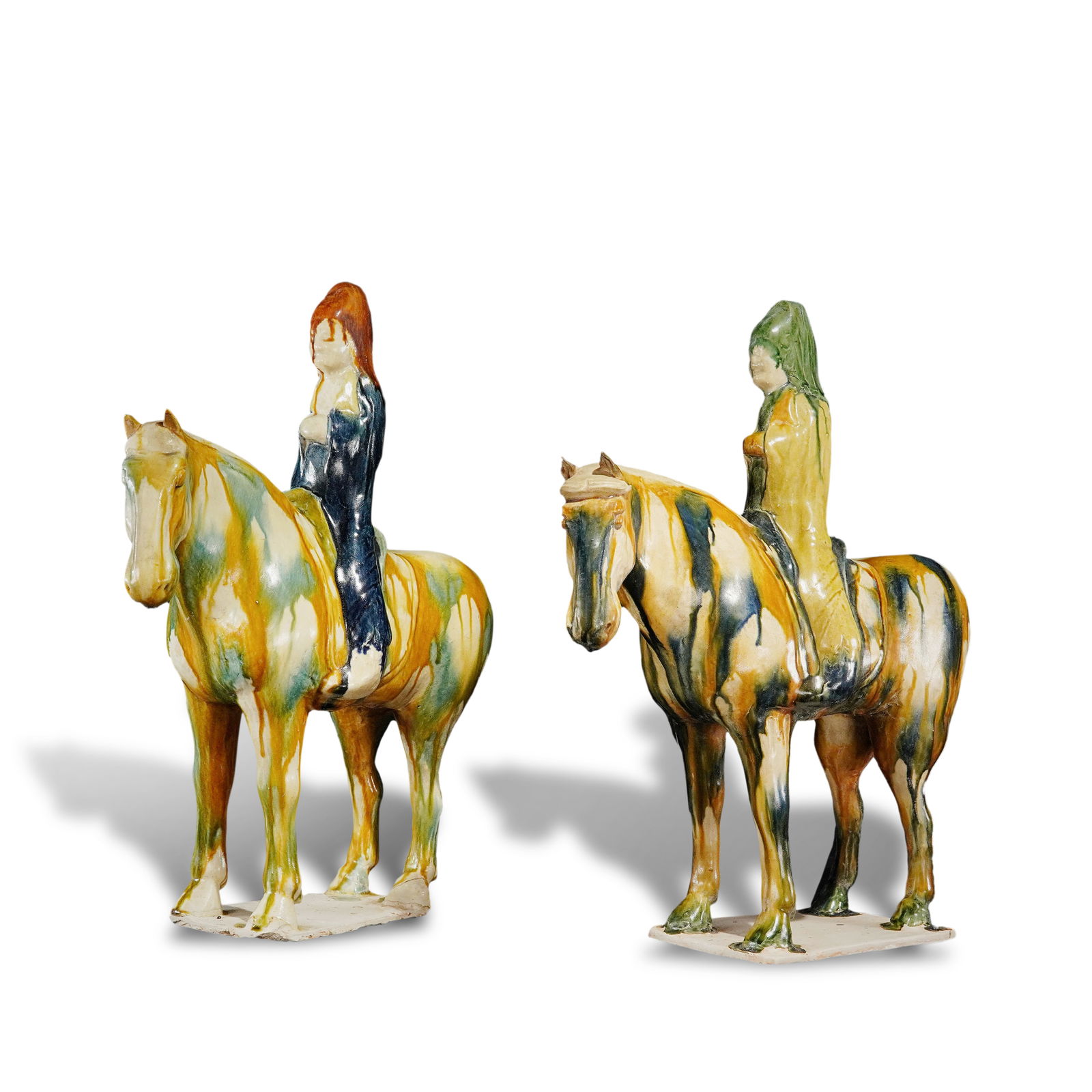 Tang Dynasty A pair of Sancai pottery figurines of horsemen in hoods (1 of 6)