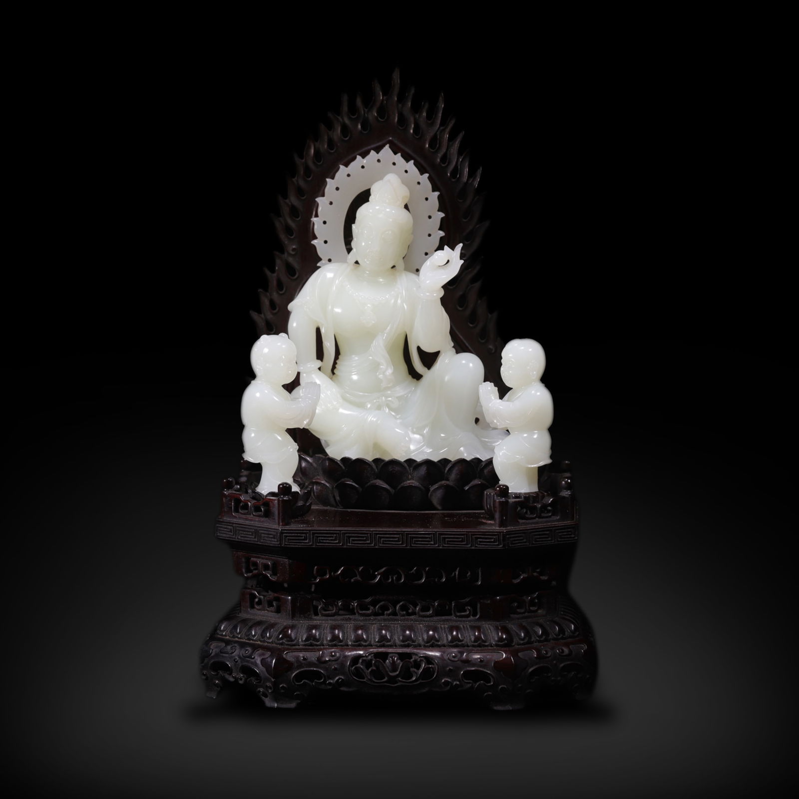 Qing Dynasty Hetian white jade carved Guanyin Bringing Children statue: Name Qing Dynasty Hetian white jade carved Guanyin Bringing Children statue Dimensions H:15cm W:11cm /H:7cm Condition Additional photographs and condition reports are available upon