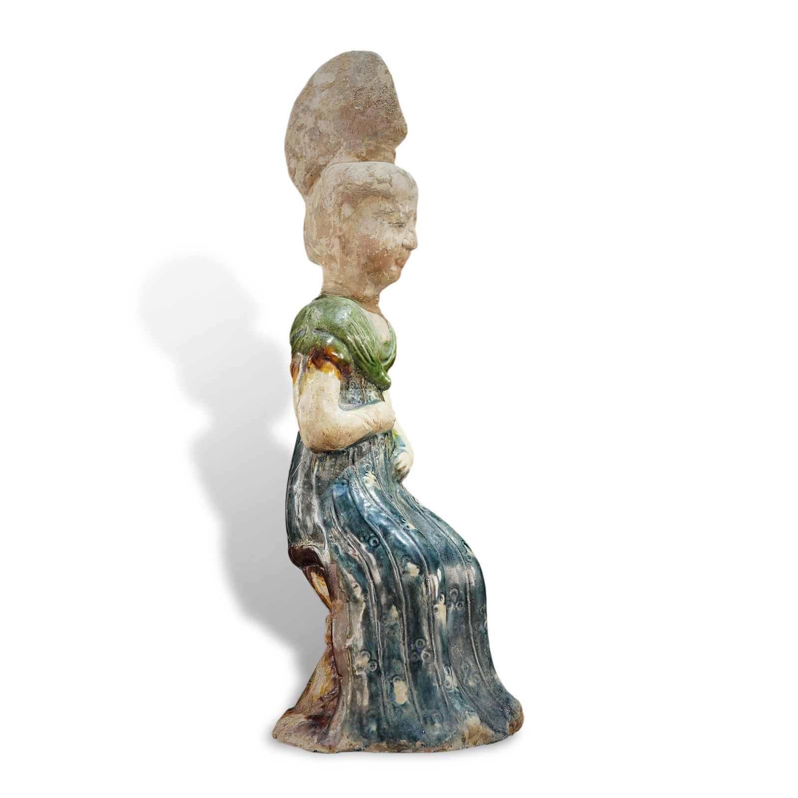 Tang Dynasty Sancai glazed pottery figurine of a lady seated on a drum (1 of 4)