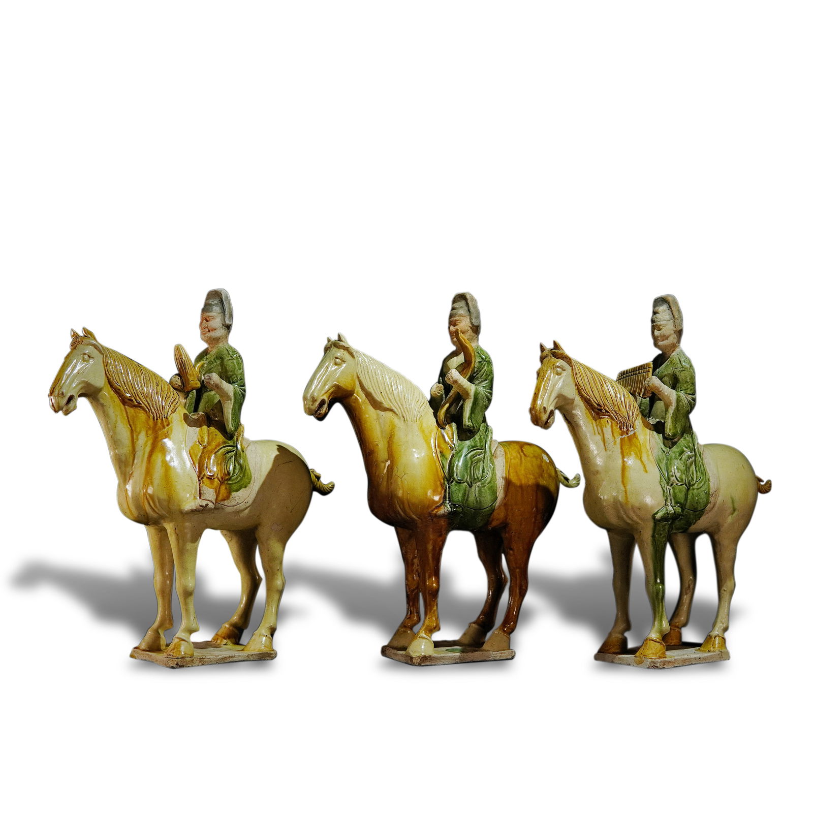 Tang Dynasty A group of Sancai glazed pottery figurines of horsemen playing musical instruments (1 of 6)