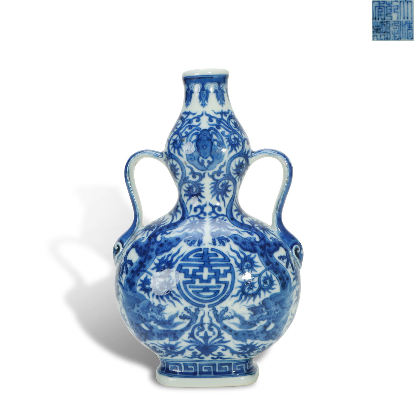 Qing Dynasty Qianlong period, Blue-and-white gourd-shaped vase with ribbon ears, decorated with "two: Name Qing Dynasty Qianlong period, Blue-and-white gourd-shaped vase with ribbon ears, decorated with "two dragons surrounding longevity" patterns Dimensions H:20cm W:12.5cm Condition