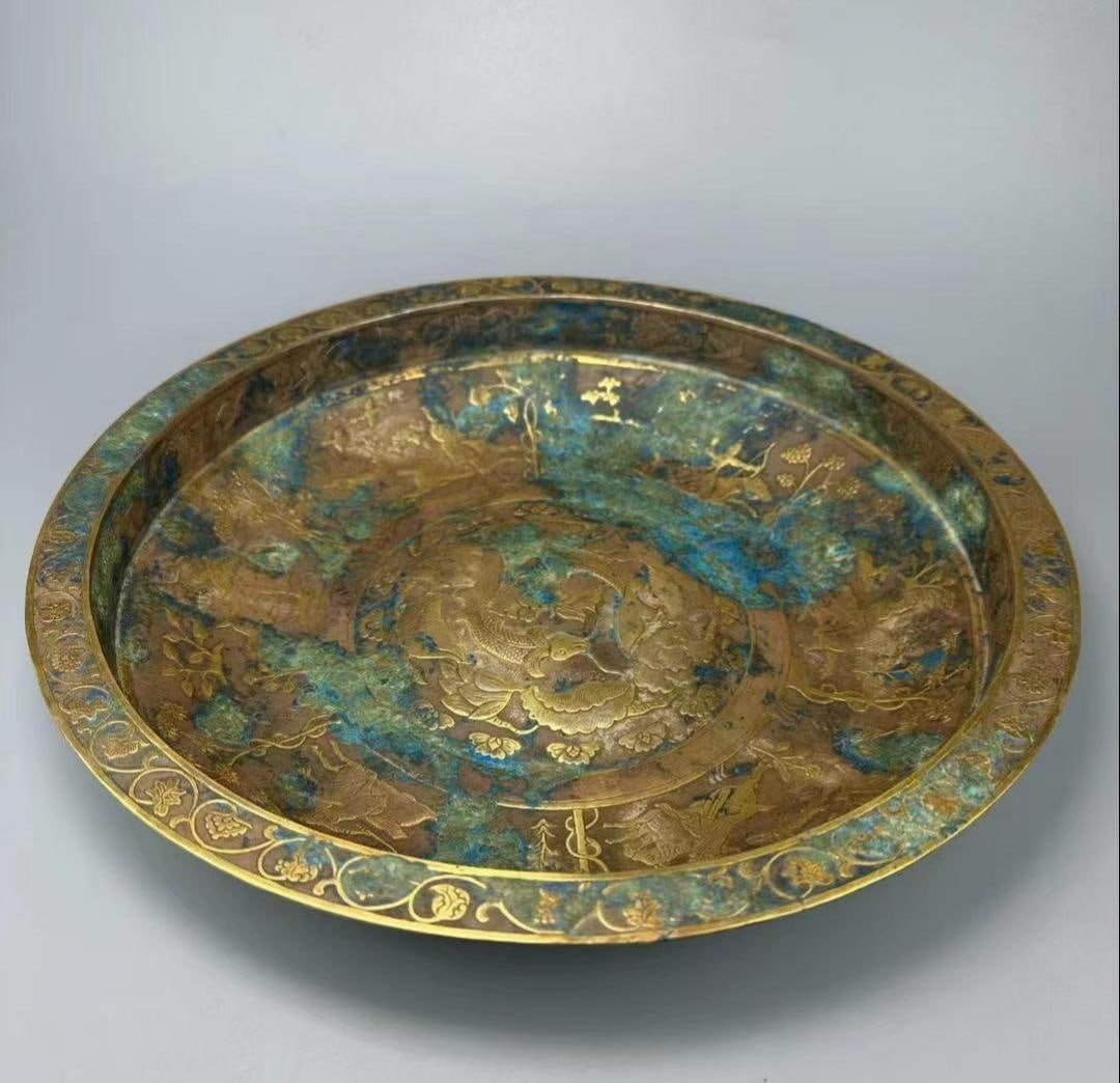 TANG DYNASTY SILVER GILDED PLATE: Name TANG DYNASTY SILVER GILDED PLATE Dimensions H:5.7CM L:34CM WT:1567G Condition Additional photographs and condition reports are available upon request as a courtesy to our client