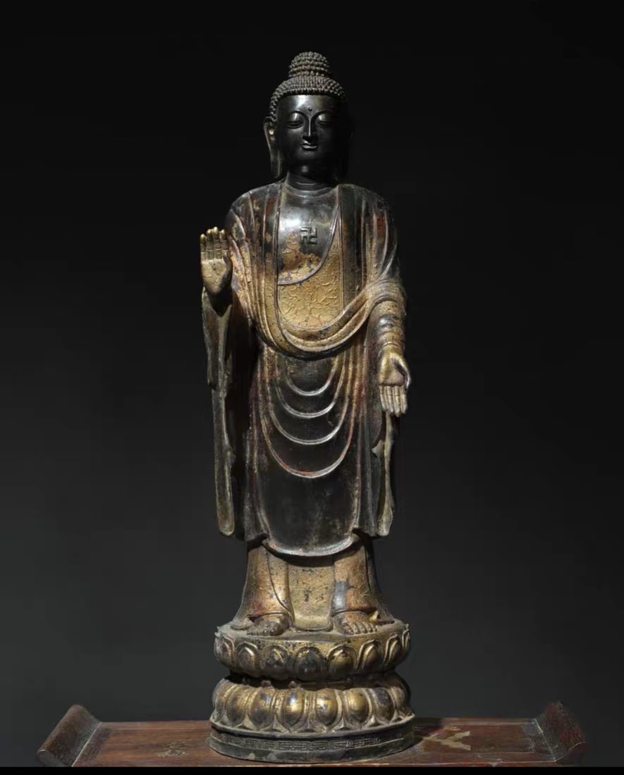 MING DYNASTY BRONZE LACQUERED AND GILDED BUDDHA STATUE: Name MING DYNASTY BRONZE LACQUERED AND GILDED BUDDHA STATUE Dimensions H:61CM Condition Additional photographs and condition reports are available upon request as a courtesy to our