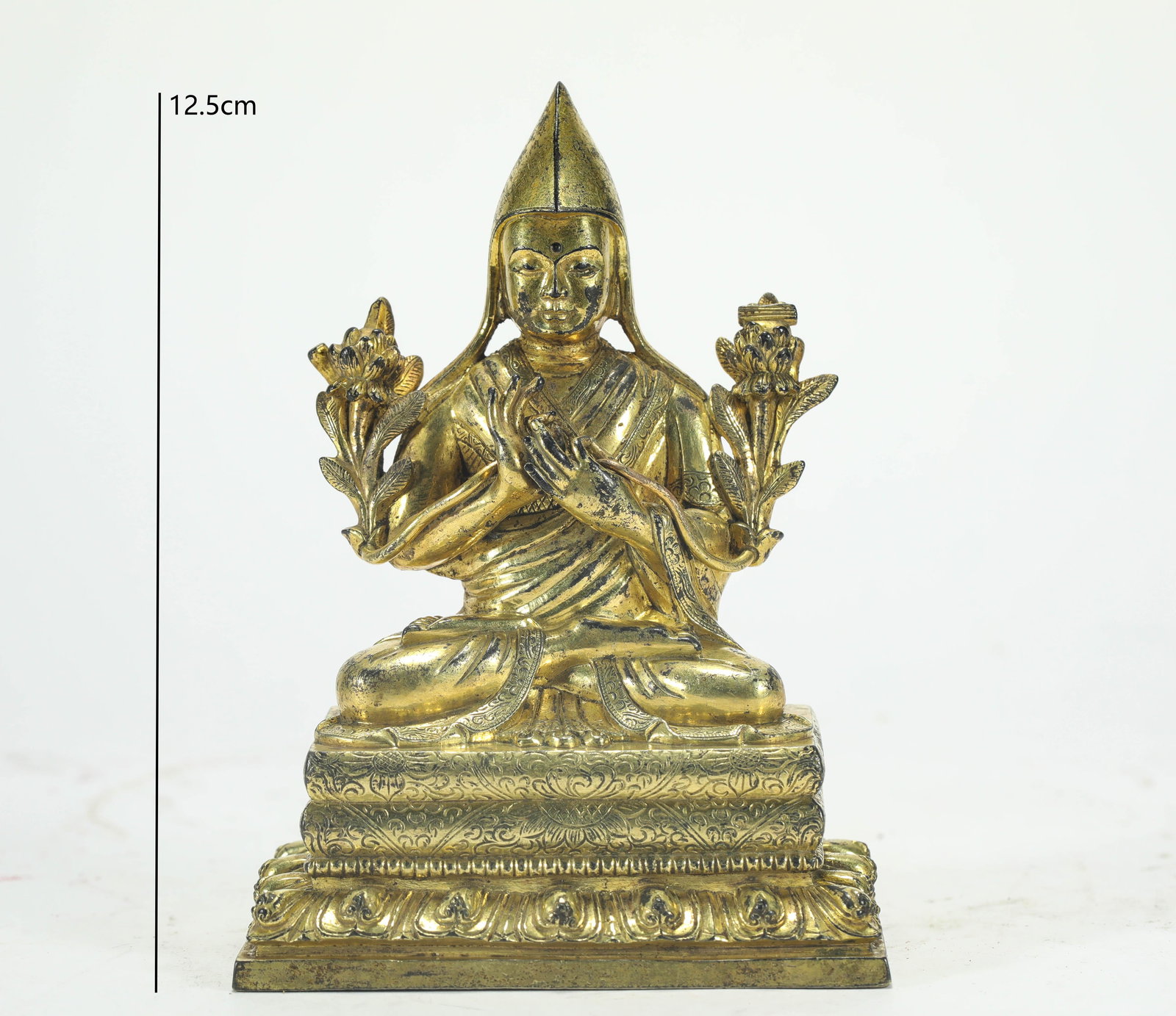 GILT BRONZE STATUE OF MASTER TSONGKHAPA FROM THE QING DYNASTY: Name GILT BRONZE STATUE OF MASTER TSONGKHAPA FROM THE QING DYNASTY Dimensions H:12.5CM Condition Additional photographs and condition reports are available upon request as a courtes