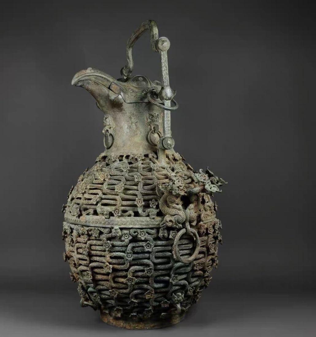 WARRING STATES BRONZE ZUN: Name WARRING STATES BRONZE ZUN Dimensions H:44CM Condition Additional photographs and condition reports are available upon request as a courtesy to our clients. Any condition report