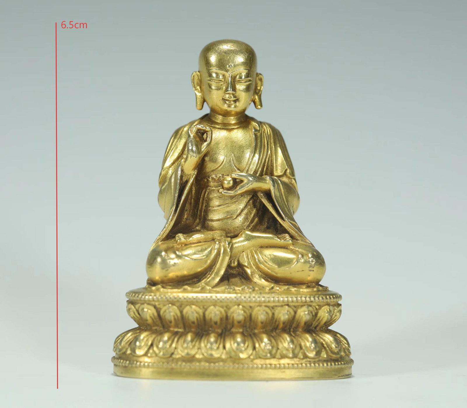 GILT BRONZE KSITIGARBHA BODHISATTVA FROM THE MING DYNASTY: Name GILT BRONZE KSITIGARBHA BODHISATTVA FROM THE MING DYNASTY Dimensions H:6.5CM Condition Additional photographs and condition reports are available upon request as a courtesy to