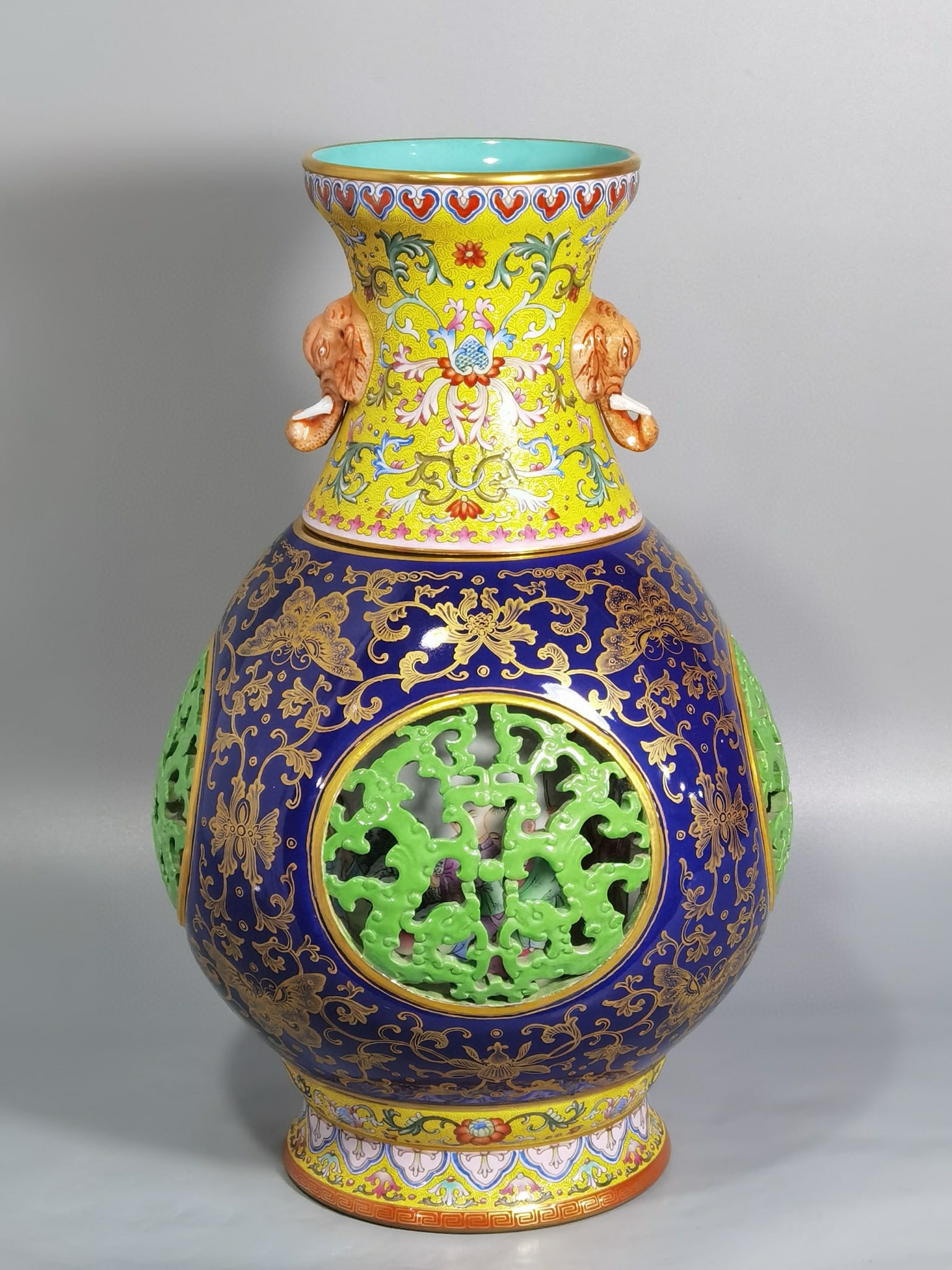 QING DYNASTY YANGCAI OPENWORK VASE: Name QING DYNASTY YANGCAI OPENWORK VASE Dimensions H:33CM Condition Additional photographs and condition reports are available upon request as a courtesy to our clients. Any conditi