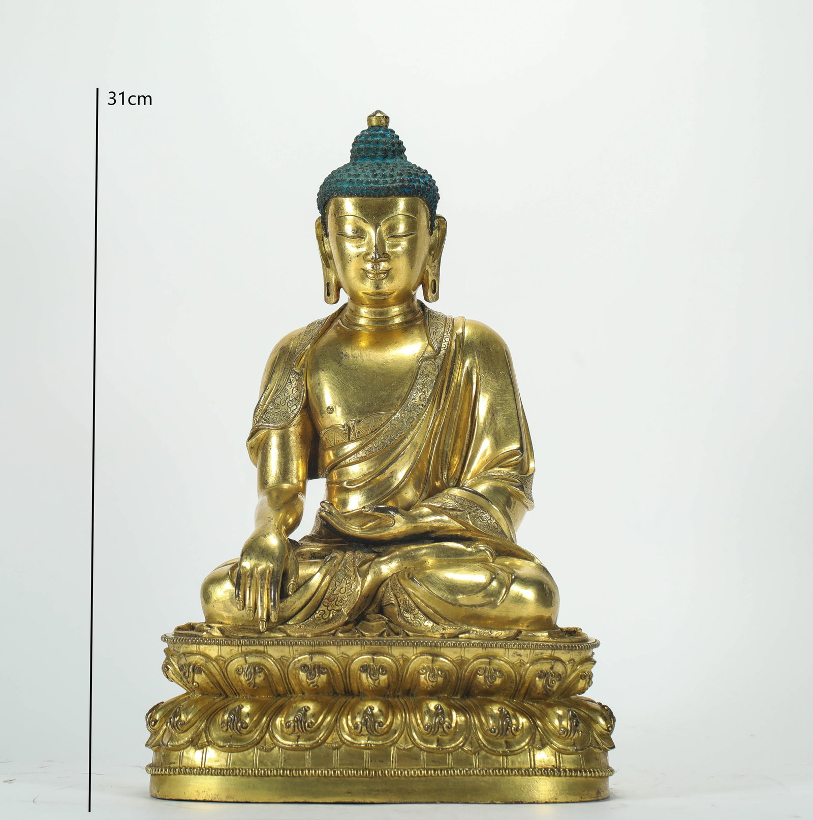 GILT BRONZE SHAKYAMUNI BUDDHA FROM THE MING DYNASTY: Name GILT BRONZE SHAKYAMUNI BUDDHA FROM THE MING DYNASTY Dimensions H:31CM Condition Additional photographs and condition reports are available upon request as a courtesy to our cli