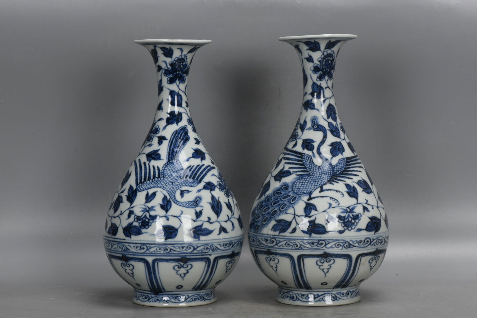A PAIR OF YUAN DYNASTY BLUE AND WHITE LOTUS-PATTERNED YUHUCHUN PORCELAINS: Name A PAIR OF YUAN DYNASTY BLUE AND WHITE LOTUS-PATTERNED YUHUCHUN PORCELAINS Dimensions H:28CM D:14.5CM Condition Additional photographs and condition reports are available upon re