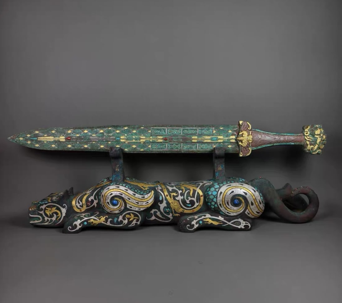 WARRING STATES PERIOD GOLD AND SILVER INLAID BRONZE SWORD: Name WARRING STATES PERIOD GOLD AND SILVER INLAID BRONZE SWORD Dimensions L:60CM Condition Additional photographs and condition reports are available upon request as a courtesy to o