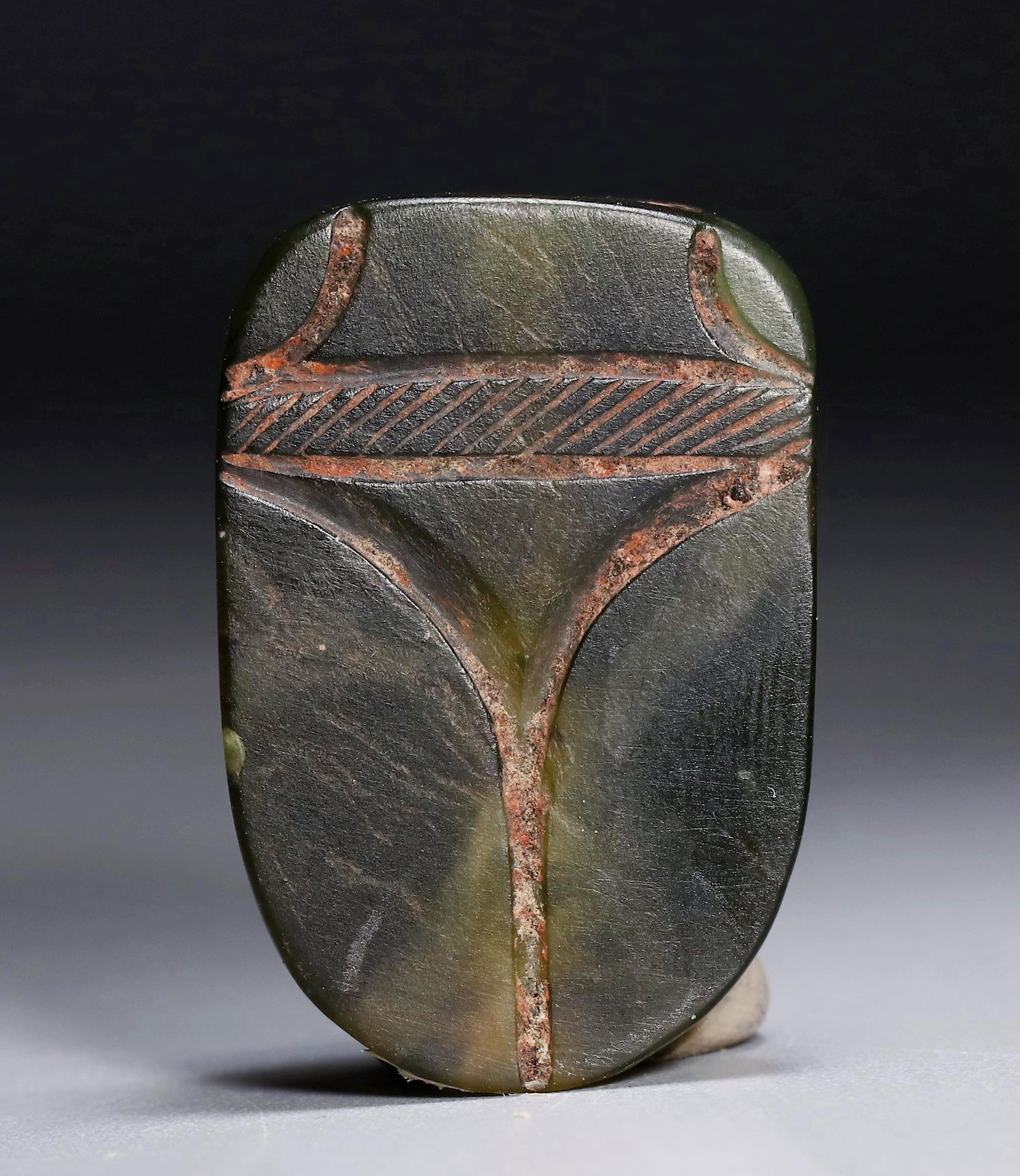 JADE CICADA OF THE LATE SHANG DYNASTY: Name JADE CICADA OF THE LATE SHANG DYNASTY Dimensions H:2.9CM L:1.9CM Condition Additional photographs and condition reports are available upon request as a courtesy to our clients.