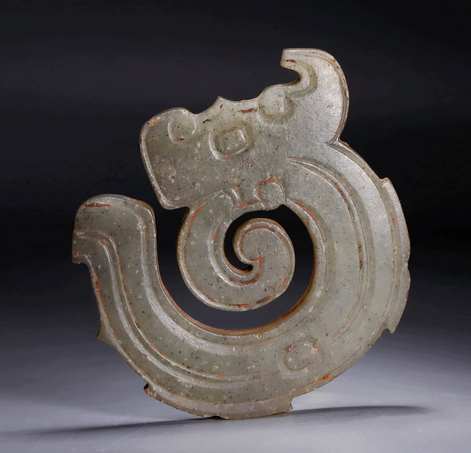 WESTERN ZHOU DYNASTY CURLY-TAILED DRAGON: Name WESTERN ZHOU DYNASTY CURLY-TAILED DRAGON Dimensions H:5.3CM L:5.2CM Condition Additional photographs and condition reports are available upon request as a courtesy to our client