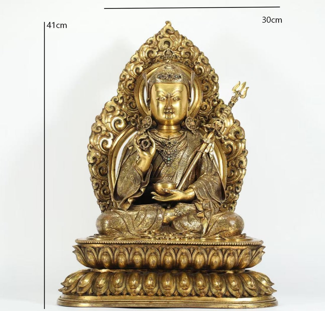 GILT BRONZE PADMASAMBHAVA OF THE QING DYNASTY: Name GILT BRONZE PADMASAMBHAVA OF THE QING DYNASTY Dimensions H:41CM Condition Additional photographs and condition reports are available upon request as a courtesy to our clients.