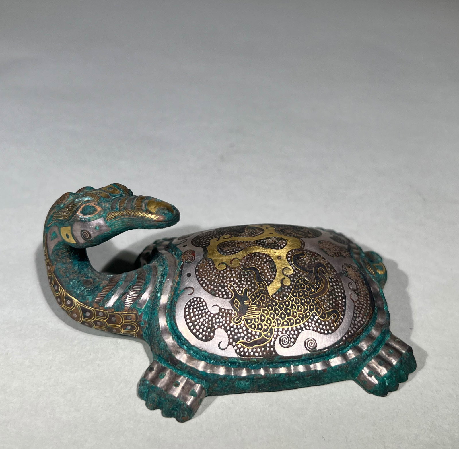 WARRING STATES PERIOD GOLD AND SILVER INLAID HOOK: Name WARRING STATES PERIOD GOLD AND SILVER INLAID HOOK Dimensions H:6CM L:11CM Condition Additional photographs and condition reports are available upon request as a courtesy to our