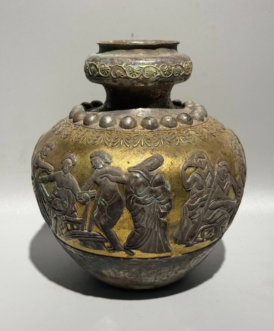 TANG DYNASTY SILVER GILT PERSIAN JAR: Name TANG DYNASTY SILVER GILT PERSIAN JAR Dimensions H:18CM Condition Additional photographs and condition reports are available upon request as a courtesy to our clients. Any condi