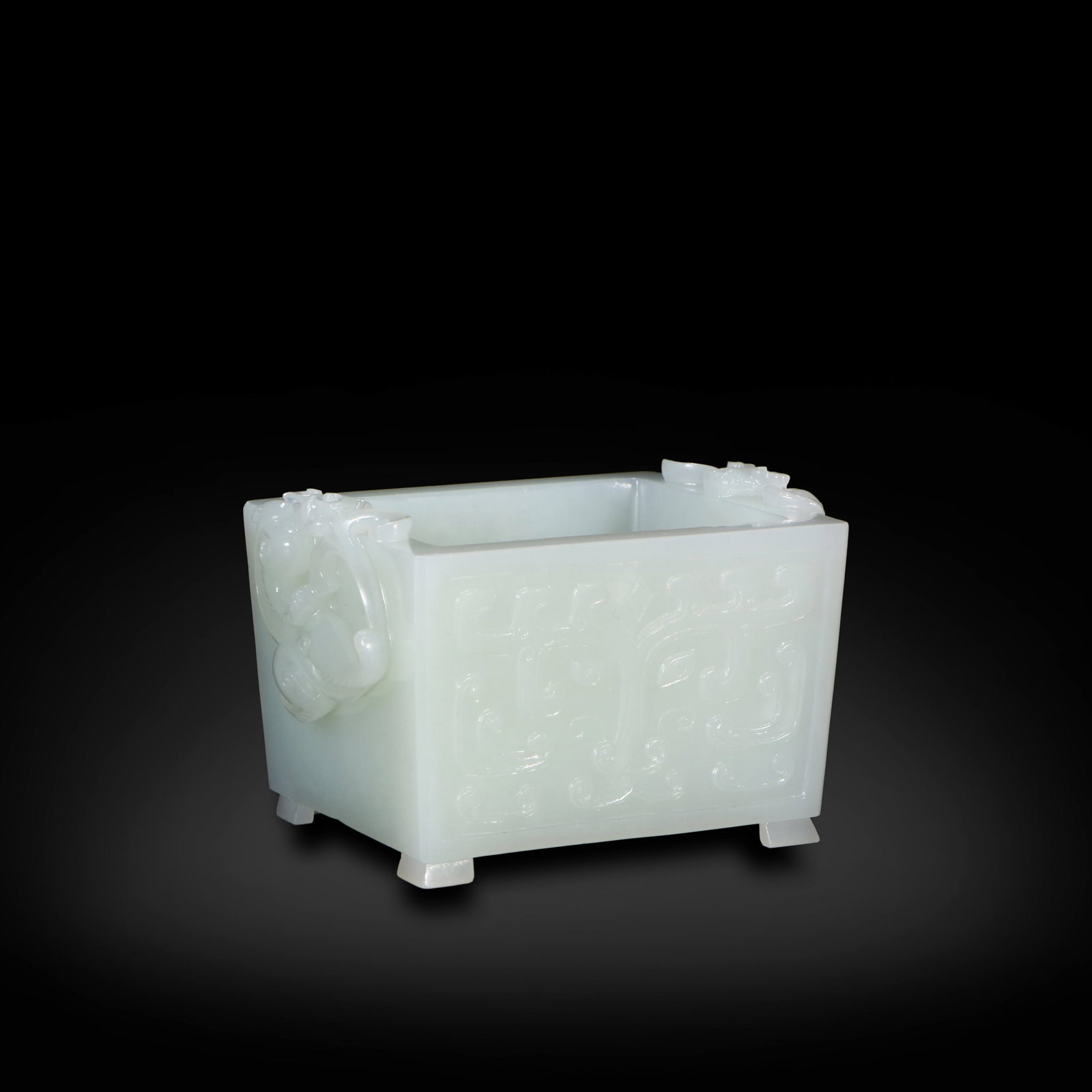 Qing Dynasty Hetian white jade carved censer with taotie patterns and chi-dragon ears: Name Qing Dynasty Hetian white jade carved censer with taotie patterns and chi-dragon ears Dimensions H:4.4cm W:7.5cm Condition Additional photographs and condition reports are avail