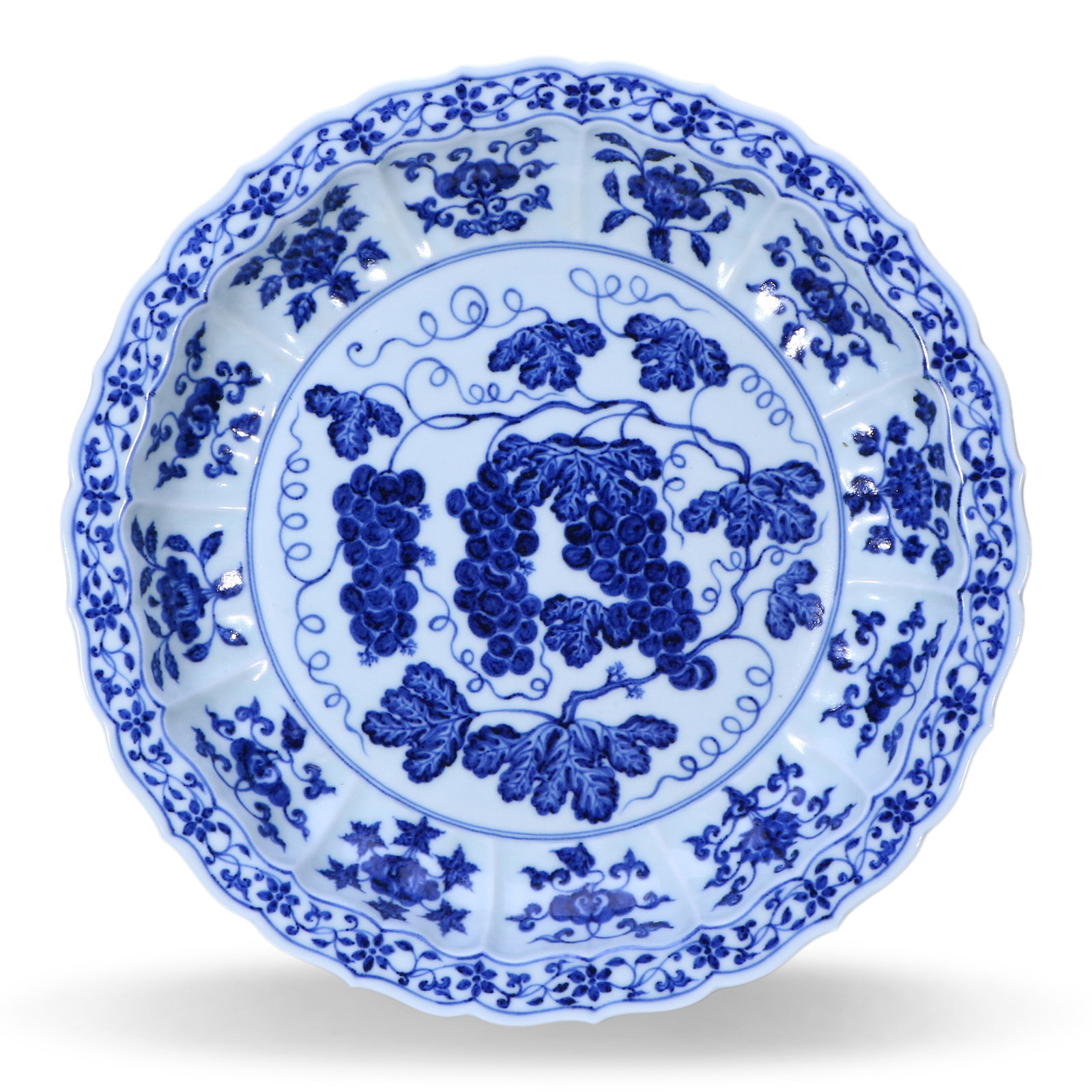 Ming Dynasty Yongle Period, Blue and White Large Foliate-Rimmed Dish with Grape Pattern: Name Ming Dynasty Yongle Period, Blue and White Large Foliate-Rimmed Dish with Grape Pattern Dimensions D:44cm Condition Additional photographs and condition reports are available up