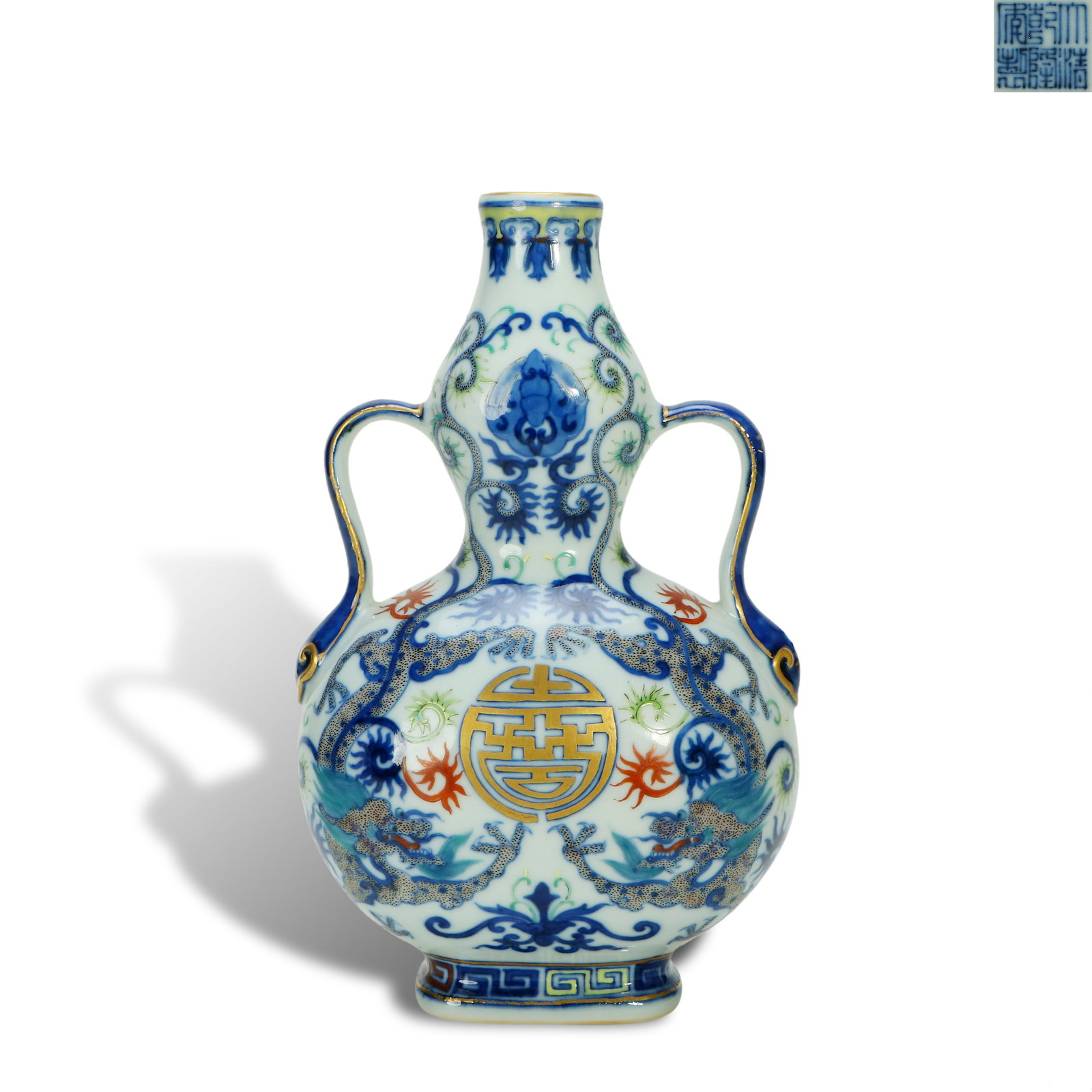 Qing Dynasty Qianlong period, Blue-and-white and famille rose flat gourd-shaped vase with ribbon: Name Qing Dynasty Qianlong period, Blue-and-white and famille rose flat gourd-shaped vase with ribbon ears, decorated with "double dragons embracing longevity" patterns Dimensions H:20cm W:12.5cm Cond