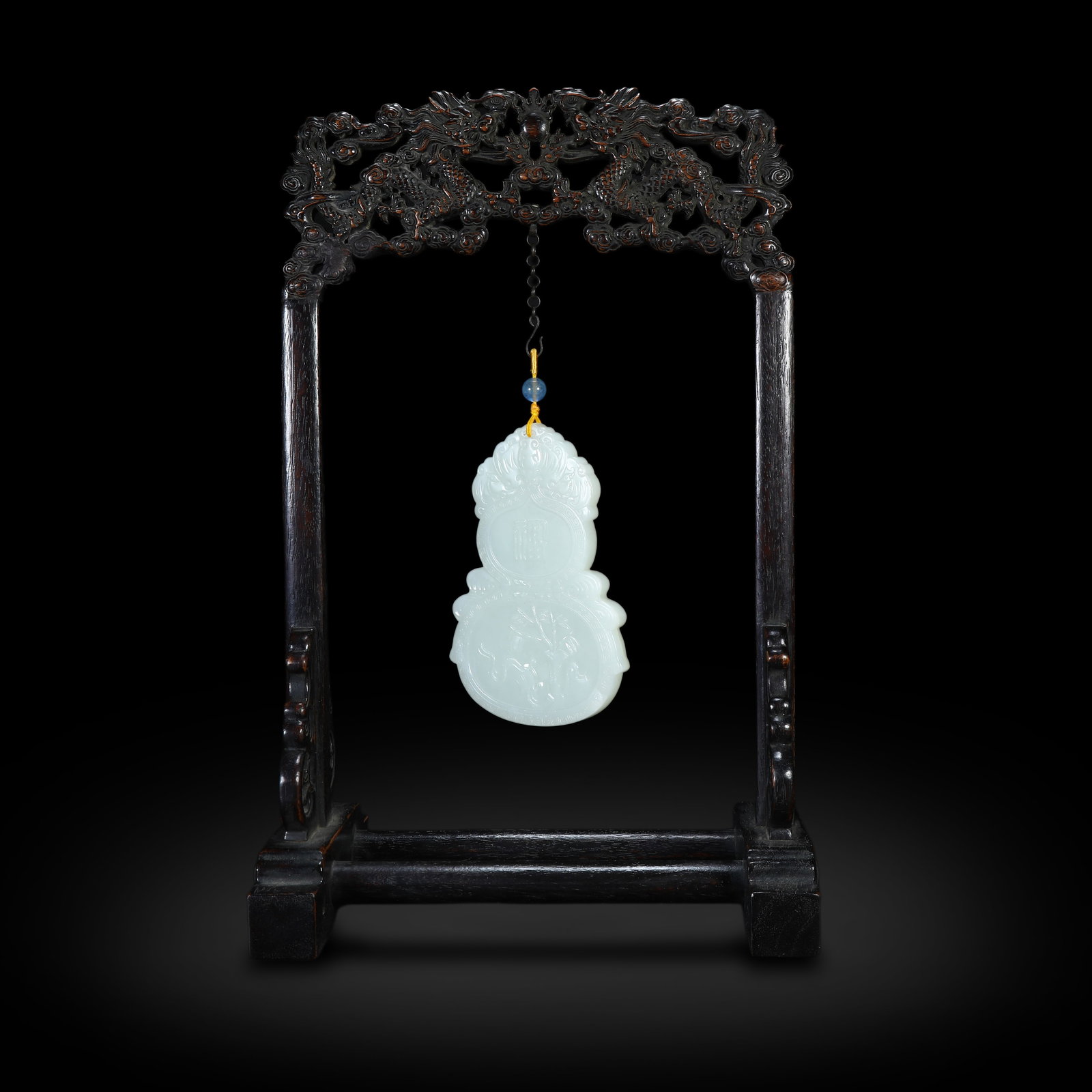Qing Dynasty Hotan White Jade Carved Gourd-Shaped Pendant with Blessing and Longevity Motifs: Name Qing Dynasty Hotan White Jade Carved Gourd-Shaped Pendant with Blessing and Longevity Motifs Dimensions ??H:10.6cm W:7.2cm Condition Additional photographs and condition reports
