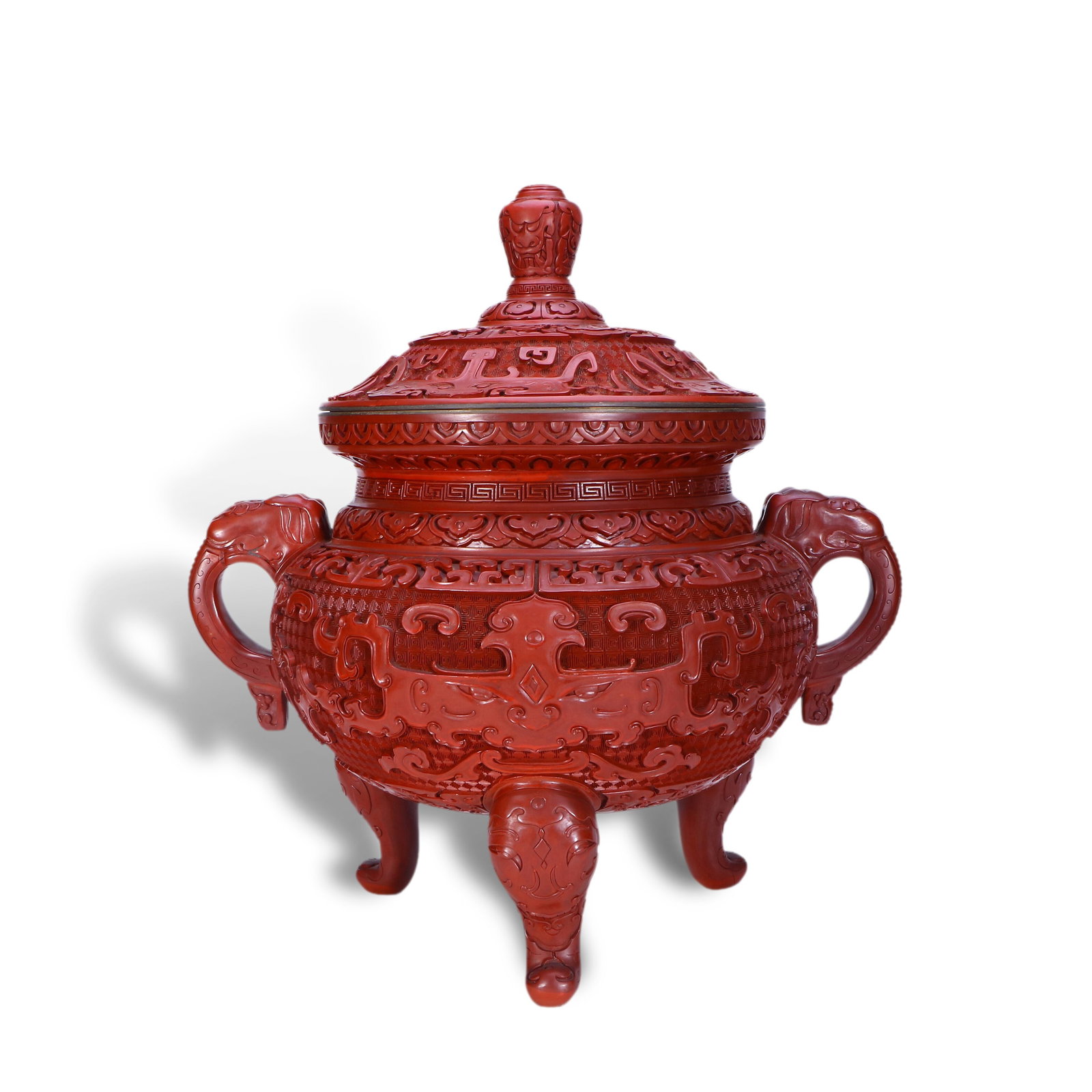 Qing Dynasty Red Lacquer Carved Tripod Censer with Taotie Pattern: Name Qing Dynasty Red Lacquer Carved Tripod Censer with Taotie Pattern Dimensions H:38.5cm W:34cm Condition Additional photographs and condition reports are available upon request as