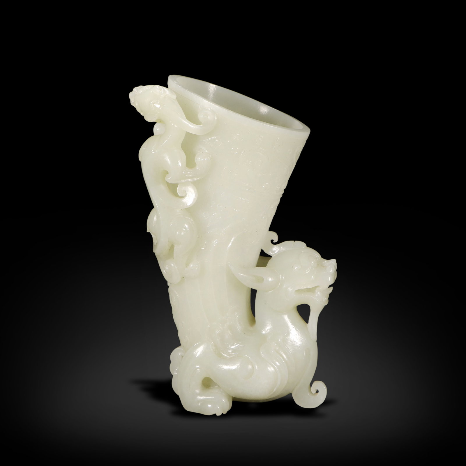 Qing Dynasty Hetian white jade horn-shaped cup with chi-dragon patterns (1 of 4)