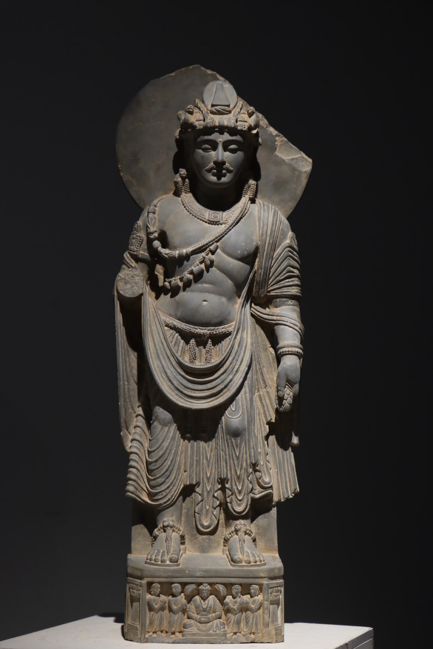 A Gandhara-style stone-carved standing Buddha statue (1 of 9)