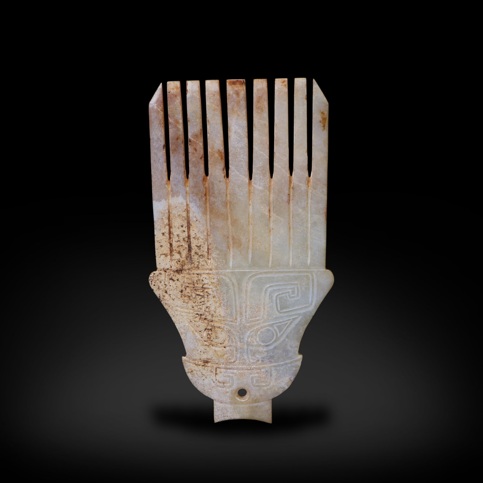 Shang Dynasty Jade comb with beast mask patterns (1 of 4)