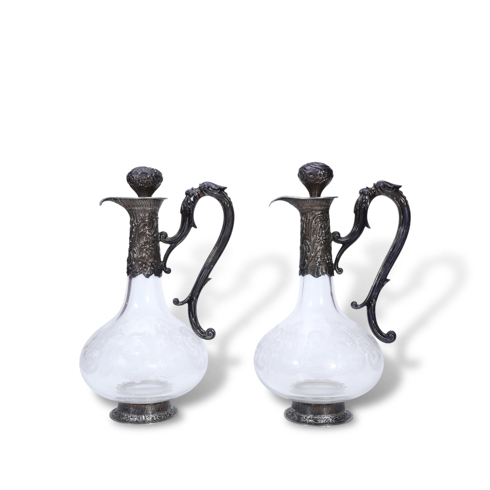 Late 19th Century French Louis XV Style Wine Ewer: Name Late 19th Century French Louis XV Style Wine Ewer Dimensions H:28cm Description Style: Louis XV StyleMaterial: Sterling Silver, Crystal GlassOrigin: FranceDescriptionThis pair of French