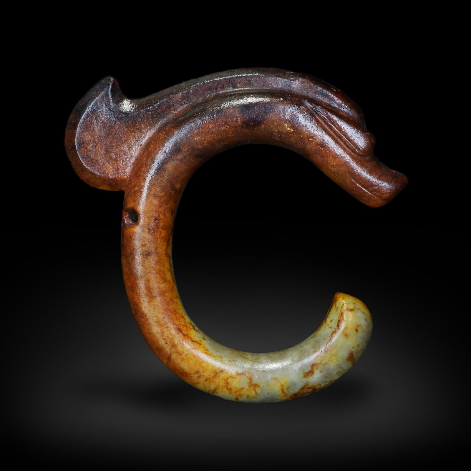 Hongshan Culture Jade C-shaped dragon: Name Hongshan Culture Jade C-shaped dragon Dimensions H:20.5cm W:21cm Description