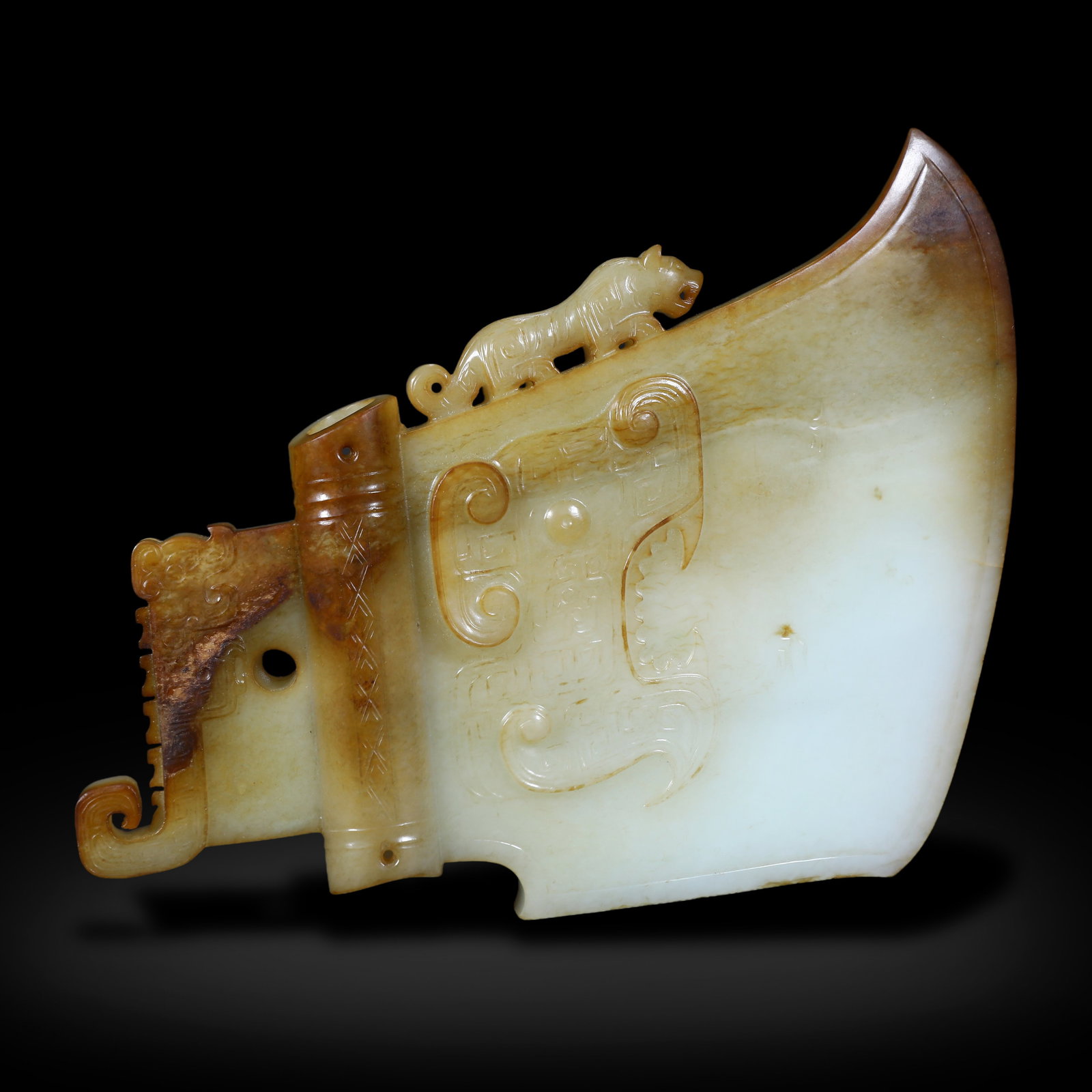 Qing Qianlong period, Antique-Style White Jade Axe with Carved Chi Tiger & Calcified Inclusions: Name Qing Qianlong period, Antique-Style White Jade Axe with Carved Chi Tiger & Calcified Inclusions Dimensions H:17.7cm W:24cm Description