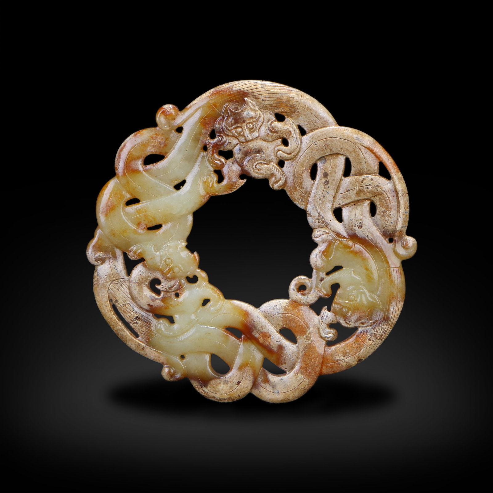 Warring States Period, Jade Carving of Six Beasts: Bear, Ch??l??ng (Dragon), and Z??uy?? (Mythical: Name Warring States Period, Jade Carving of Six Beasts: Bear, Ch??l??ng (Dragon), and Z??uy?? (Mythical Creature) on a Cloud Jade Ring. Dimensions W:8.1cm Description