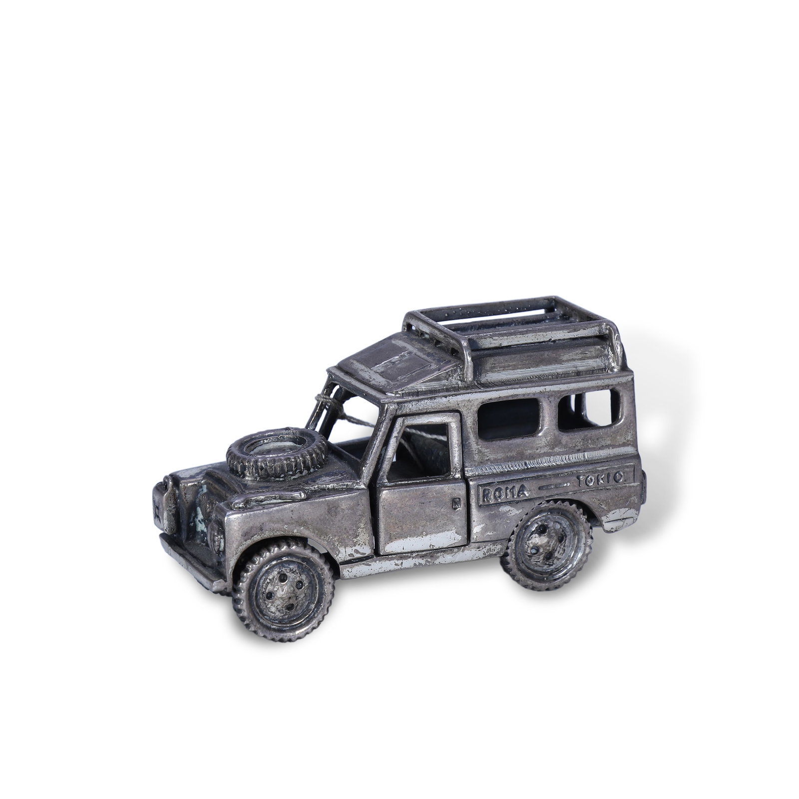 1970s Silver Land Rover Defender Model: Name 1970s Silver Land Rover Defender Model Dimensions H:4.1cm W:7.2cm Description