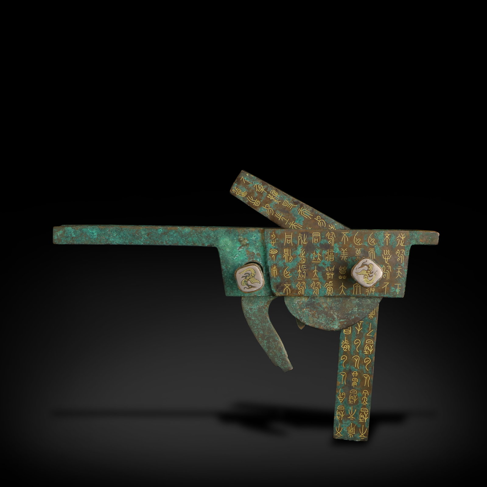 Warring States Period Bronze crossbow mechanism inlaid with gold and silver, with inscriptions (1 of 6)