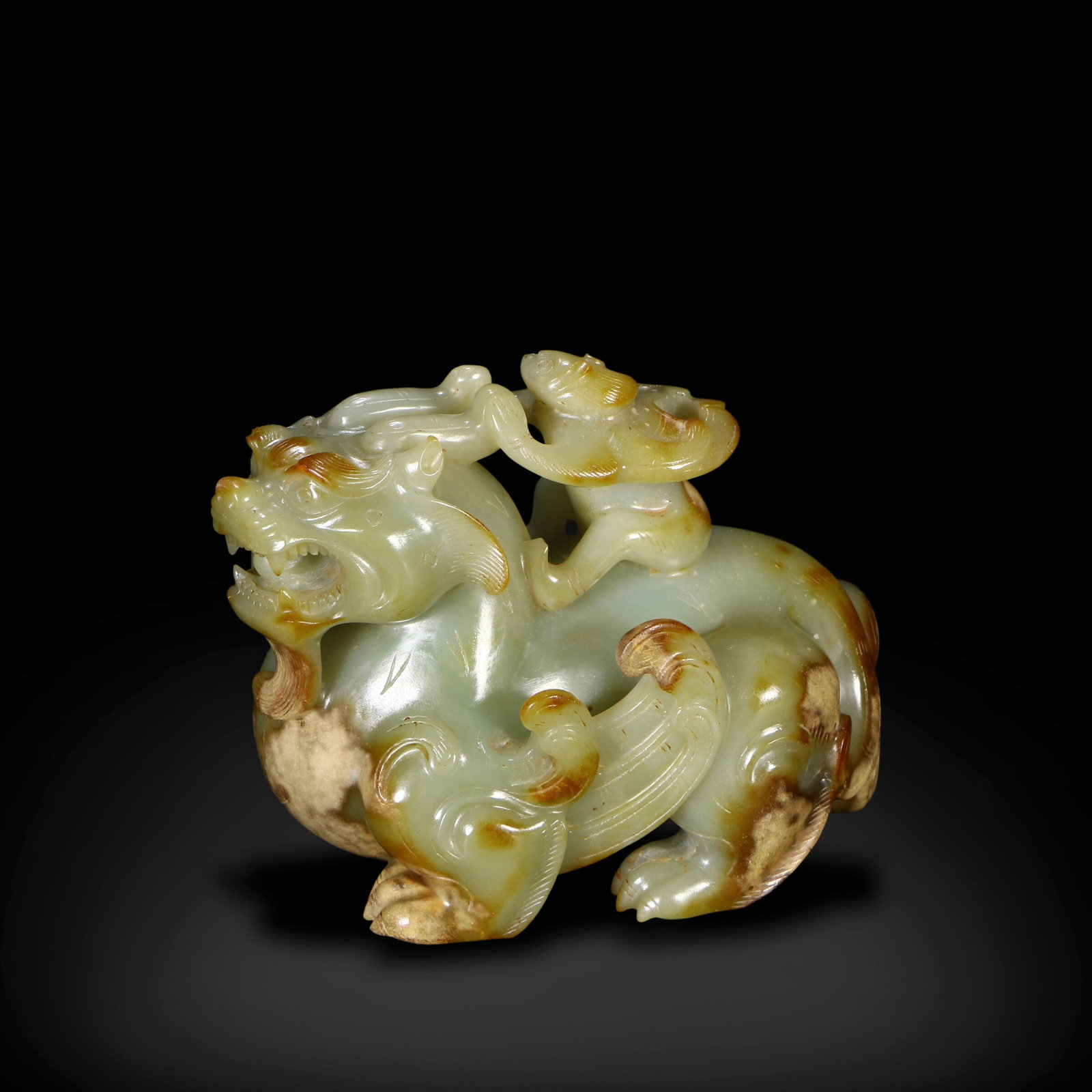 Han Dynasty Jade mythical feathered beast Pixiu: Name Han Dynasty Jade mythical feathered beast Pixiu Dimensions H:9.7cm W:12.4cm Description