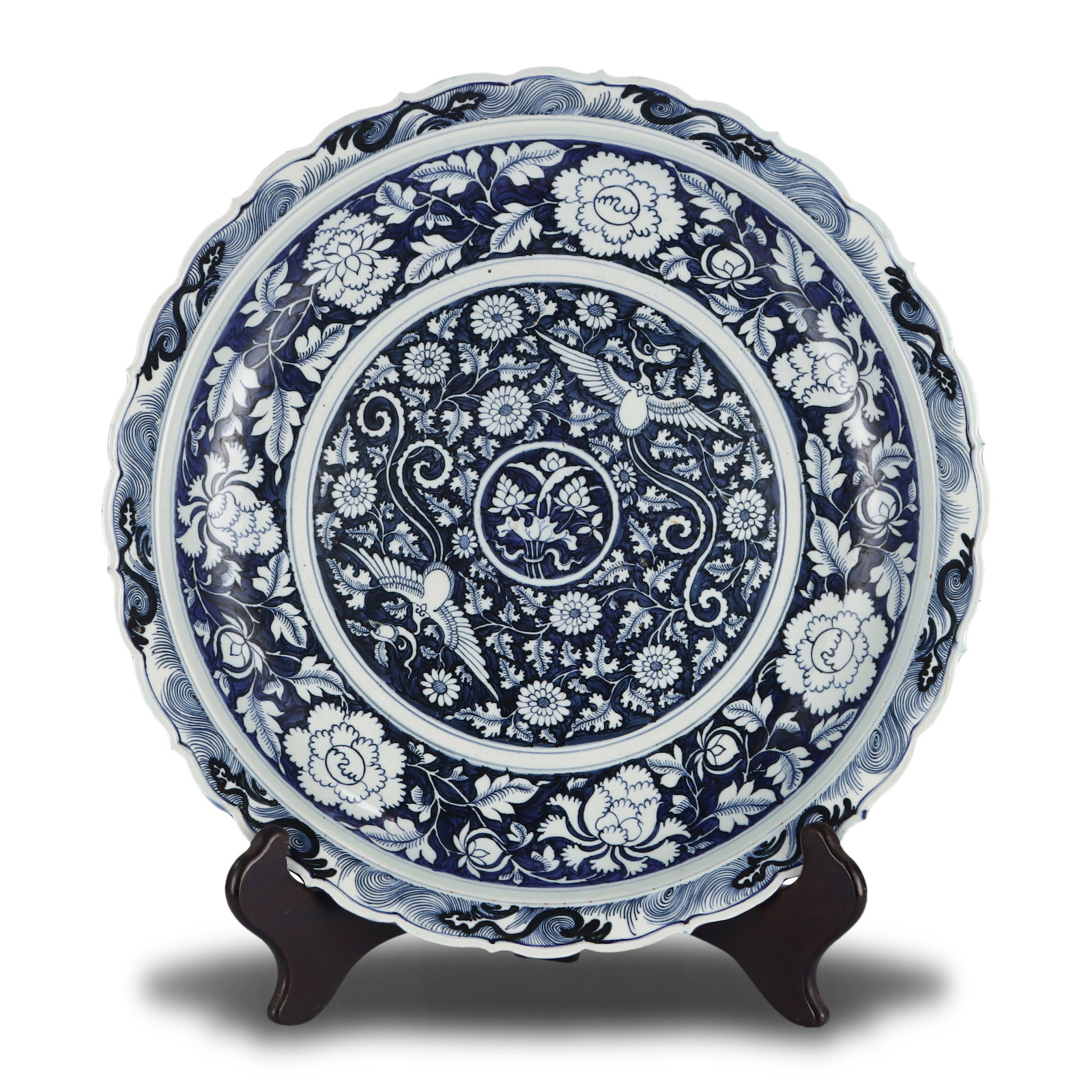 Yuan Dynasty Large blue-and-white lotus-shaped plate with double phoenix and floral patterns: Name Yuan Dynasty Large blue-and-white lotus-shaped plate with double phoenix and floral patterns Dimensions D:48.8cm Description