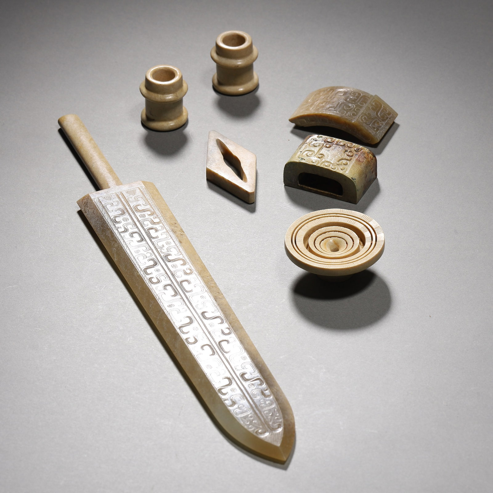Warring States Period, Set of Jade Sword Fittings: Name Warring States Period, Set of Jade Sword Fittings Dimensions Various Sizes Description