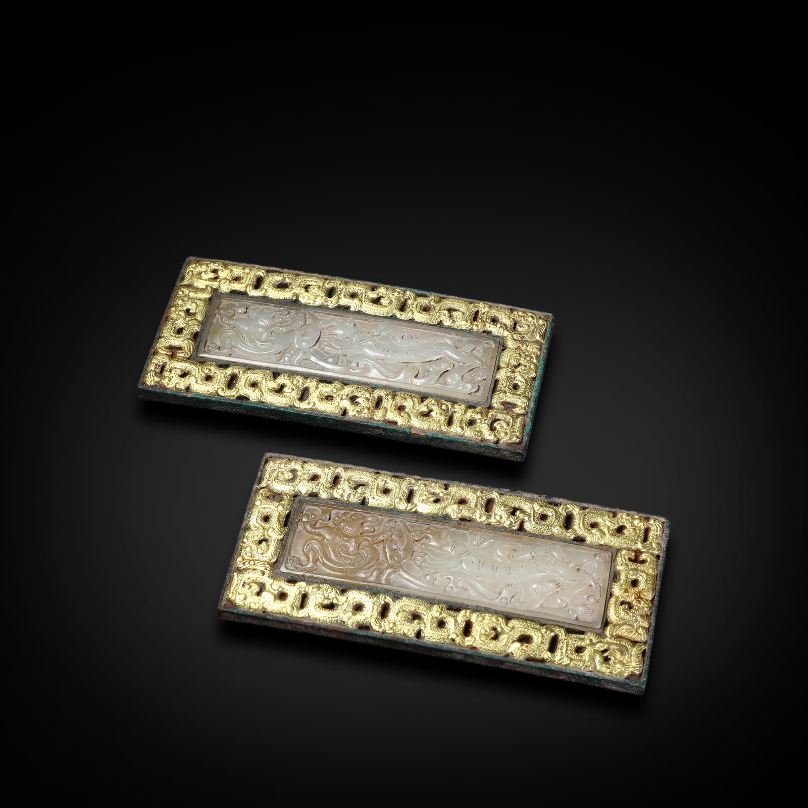 Warring States Period Pair of Gilt Bronze Belt Plates Inlaid with Jade, Bear and Tiger Motifs: Name Warring States Period Pair of Gilt Bronze Belt Plates Inlaid with Jade, Bear and Tiger Motifs Dimensions H:5cm W:11.5cm Description