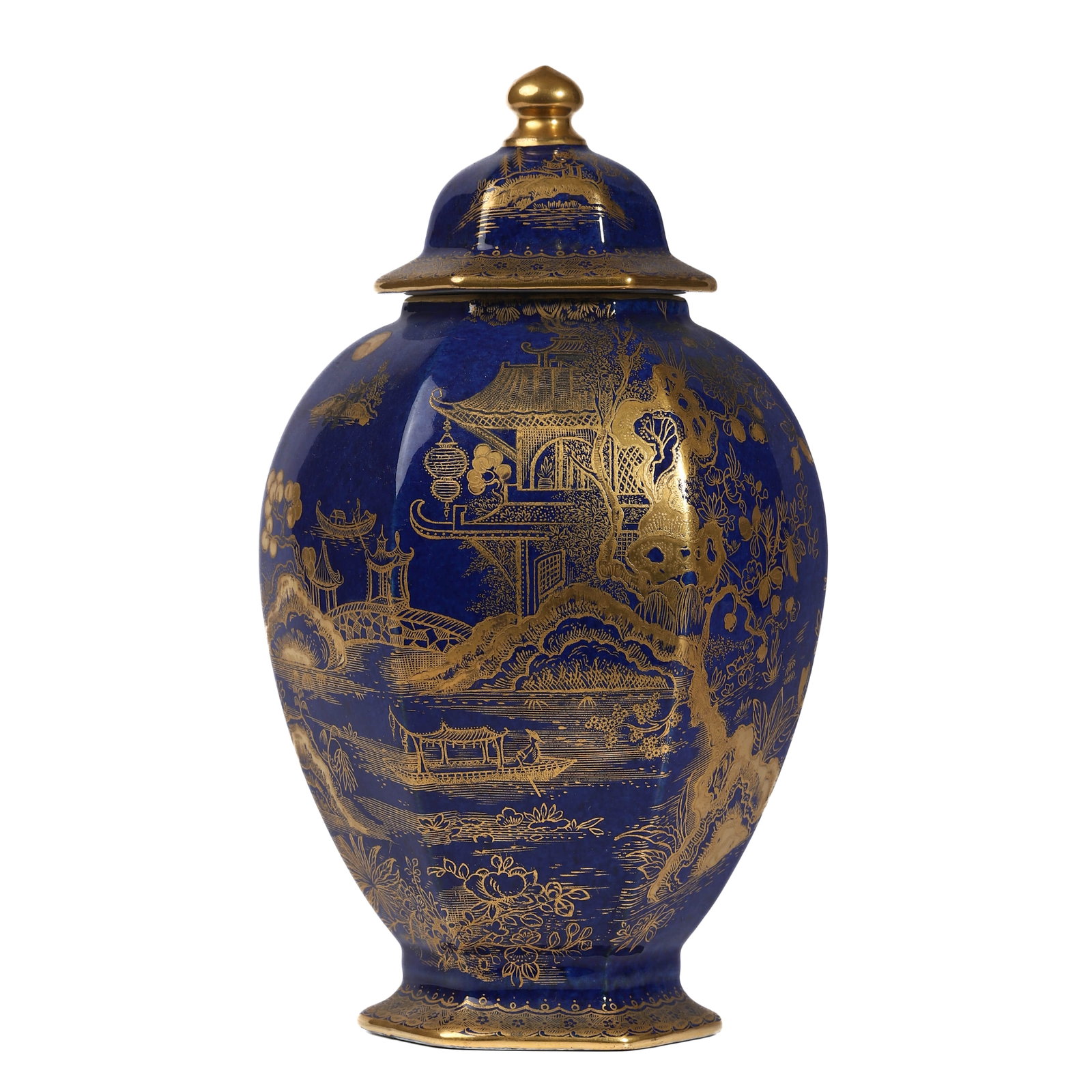 WILTON WARE COBALT-BLUE AND GILT CHINOISERIE LIDDED JAR, CIRCA 1920?C1940: Dimensions Height: 9 in (23 cm). Description A Wilton Ware cobalt-blue lidded jar decorated with finely executed gilt chinoiserie scenes, featuring pavilions, bridges, mountains, and river boats