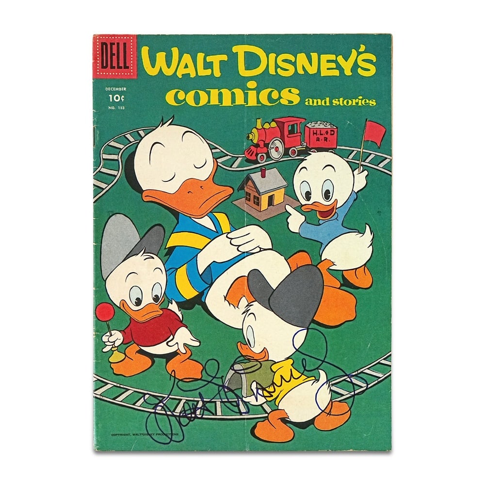 WALT DISNEY, SIGNED "WALT DISNEY'S COMICS AND STORIES" (NO. 183, 1955): 10 1/4 x 7 1/4 in (26 x 18.5 cm) A signed copy of Walt Disney's Comics and Stories represents a highly desirable and scarce example of Disney-related memorabilia, directly associated with one of the