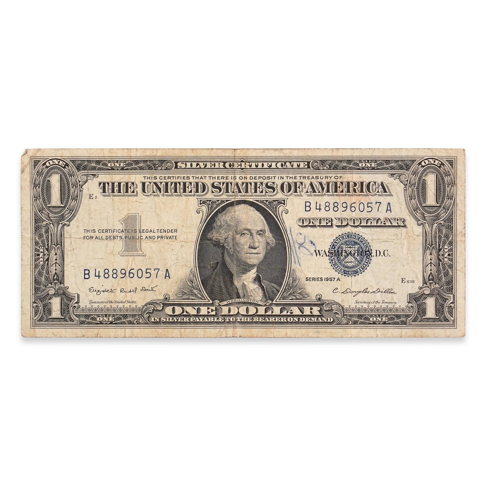 MARILYN MONROE, SIGNED ONE DOLLAR SILVER CERTIFICATE: 6 1/8 x 2 1/2 in (15.5 x 6.5 cm) This signed one dollar silver certificate is associated with Marilyn Monroe, one of the most enduring cultural icons of the twentieth century. As a figure whose