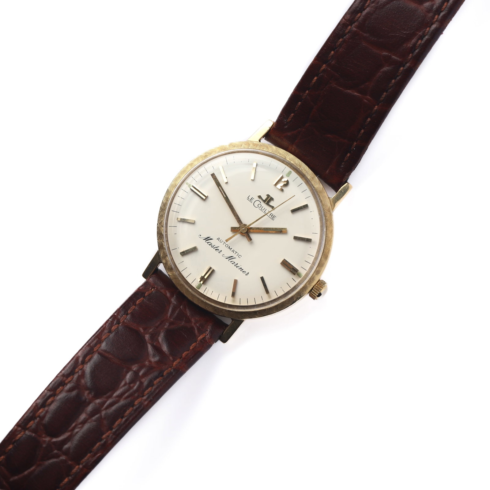 JAEGER-LECOULTRE MASTER MARINER AUTOMATIC WRISTWATCH: Dimensions Dial diameter: 1 7/16 in (35.9 mm); Overall length: 9 1/4 in (23.5 cm) Description A vintage Jaeger-LeCoultre Master Mariner automatic wristwatch featuring a gold-tone round case with a fin