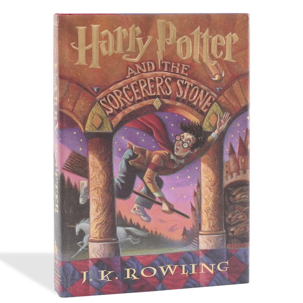 J. K. ROWLING, SIGNED "HARRY POTTER AND THE SORCERER'S STONE" FIRST EDITION: 9 1/4 x 6 1/4 in (23.5 x 16 cm) Few literary works of the modern era possess the cultural impact and global recognition of Harry Potter and the Sorcerer's Stone. As the book that introduced the world