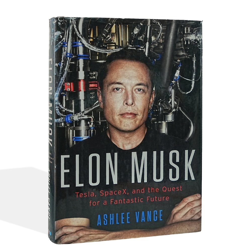 ELON MUSK, SIGNED ELON MUSK: TESLA, SPACEX, AND THE QUEST FOR A FANTASTIC FUTURE: 9 1/4 x 6 1/4 in (23.5 x 16 cm) Provenance and Authentication: This collectible has undergone a rigorous forensic evaluation. The signatures were carefully analyzed across multiple criteria,